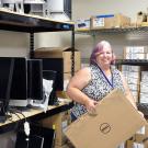 Staff member working in computer storage area
